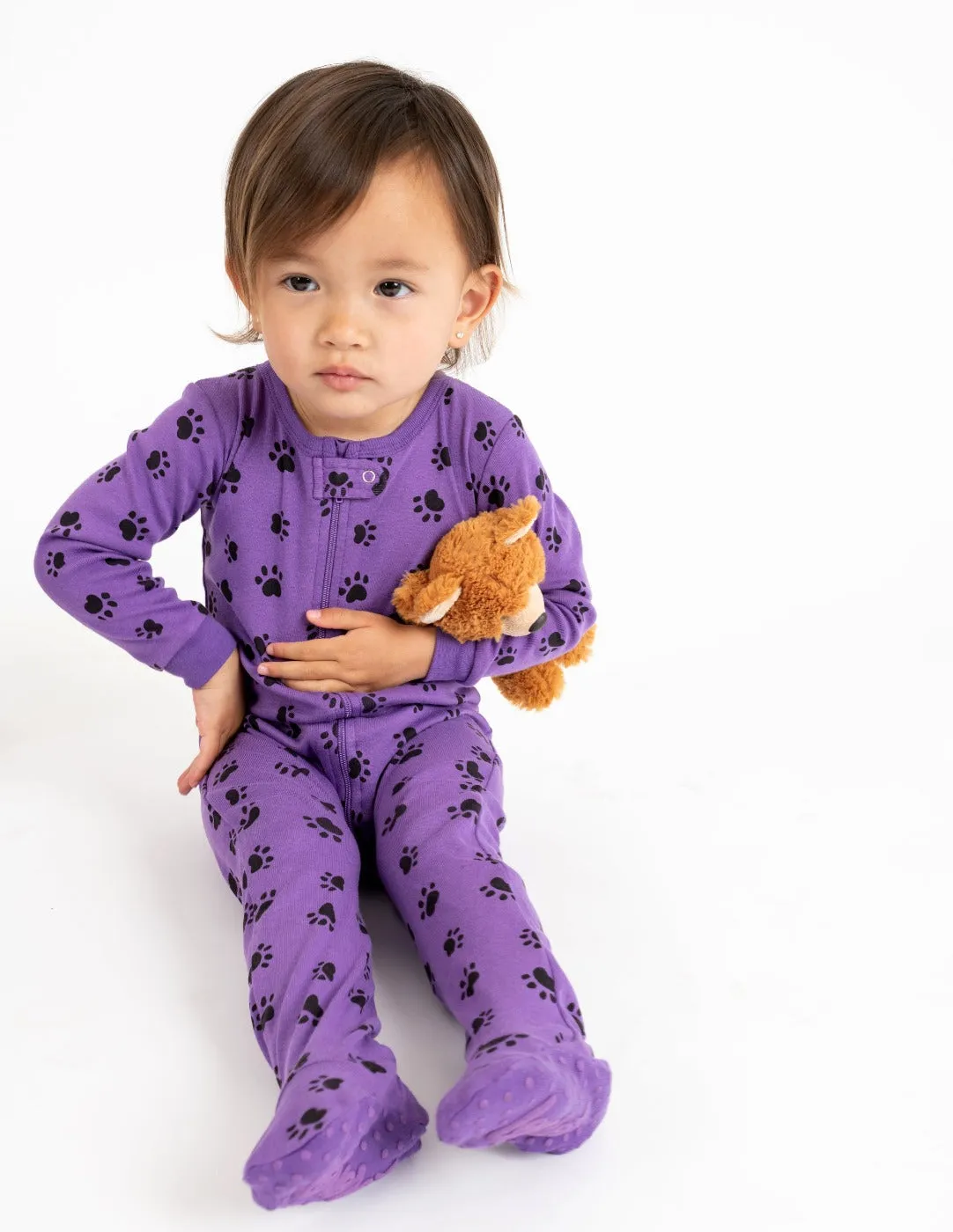 Kids Footed Purple Paw Print Pajamas