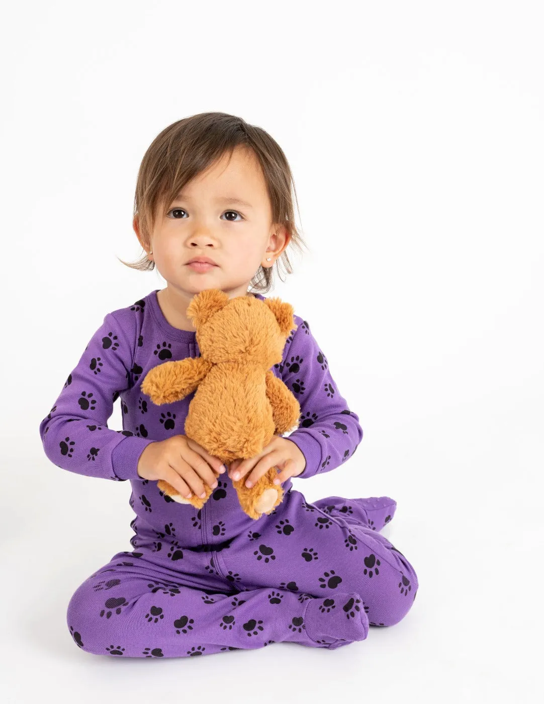 Kids Footed Purple Paw Print Pajamas