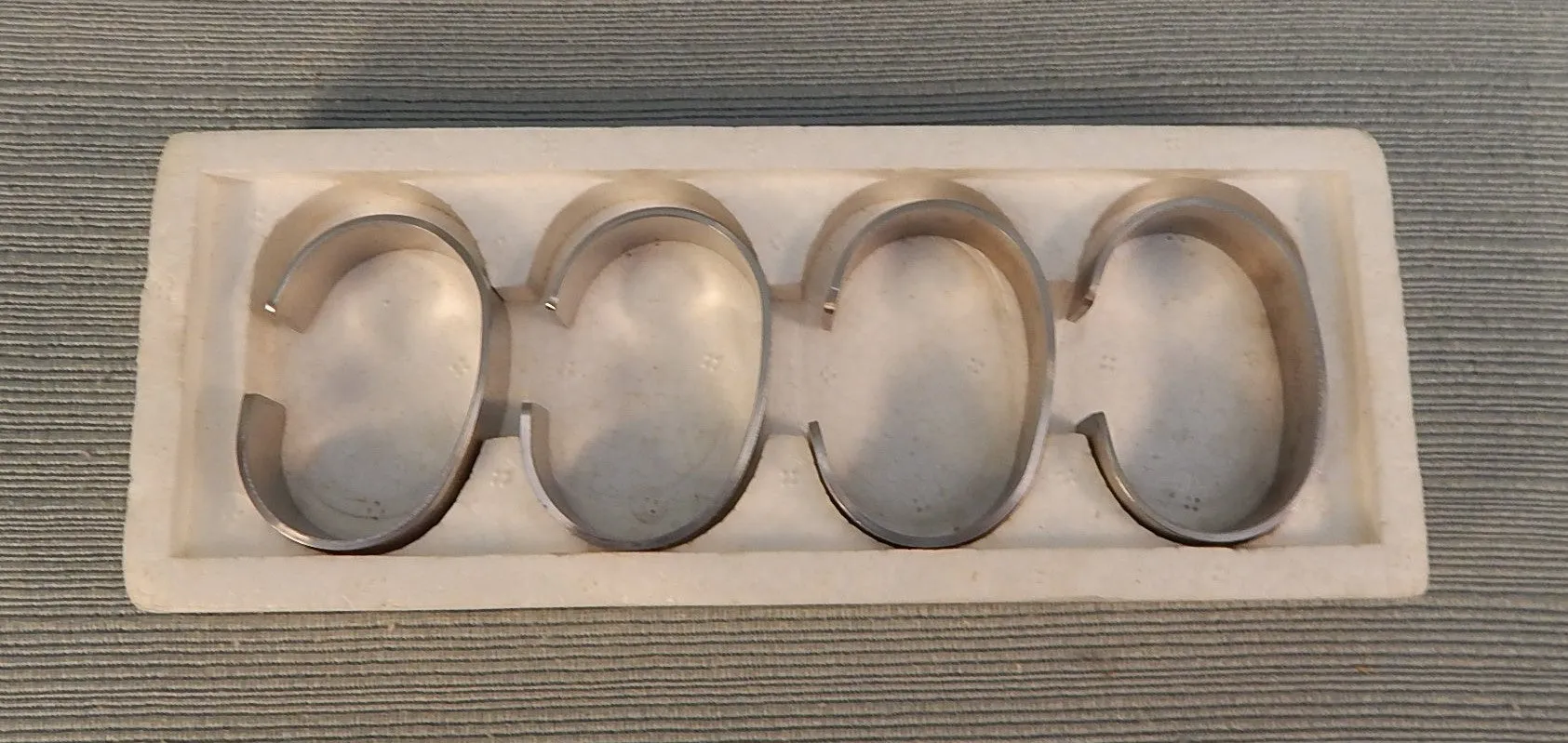 Set of 4 Stelton Stainless Steel Napkin Rings - Very Good Condition